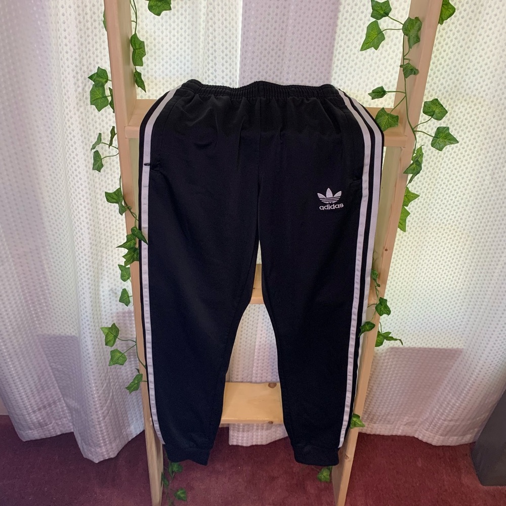 Black Adidas sweatpants